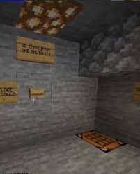 It's a screenshot of someone's stream. It shows the button room beneath the stage. It has stone walls and flooring. A crafting table replaces the corner floor block. A glowstone gives the room some light in the ceiling. In the center of the wall is an oak button. Around it are oak signs all with various words on them. TO EMANCIPATE THE BRUTALTITY and WAS A PLACE WHERE MEN COULD and part of another line from the L'manberg anthem that is cut off from the cropping. All of the lyrics are written in capital letters.